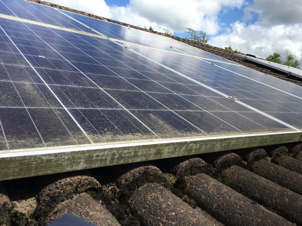 Solar panels cleaned with pure water in Clydebank — solar panels covered in grime