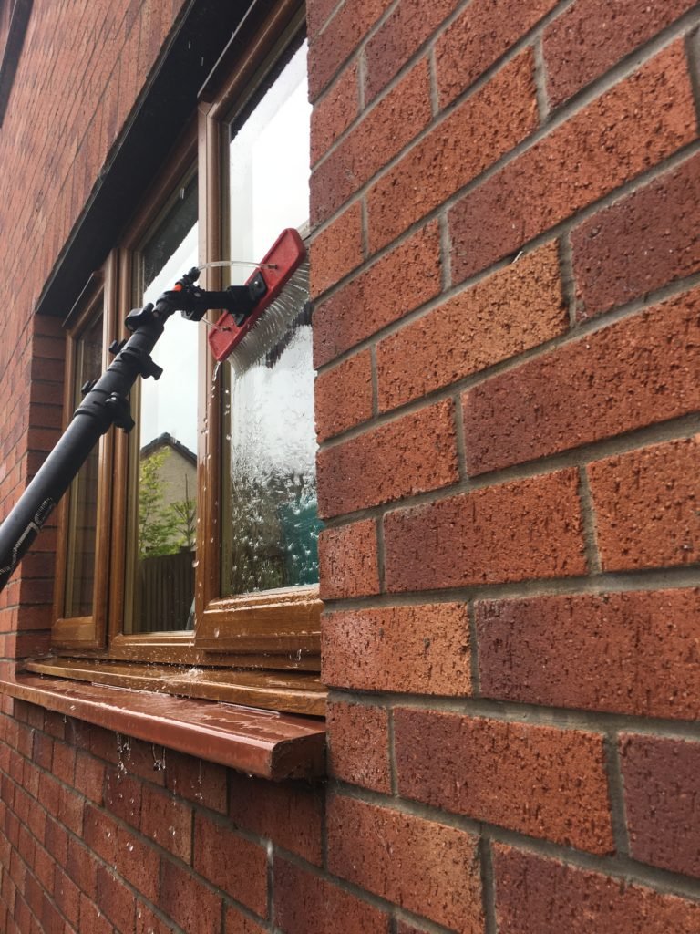 Window cleaning in Clydebank with a water-fed pole