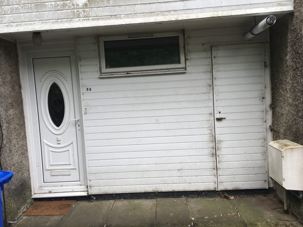 Grubby uPVC cladding before washing