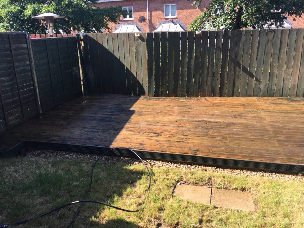 Window Cleaner Clydebank 4 Decking pressure washed in Clydebank — decking half stripped of algae