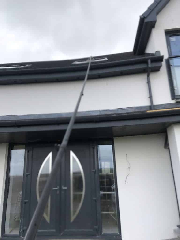 Window cleaning in New Stevenston with a water-fed pole
