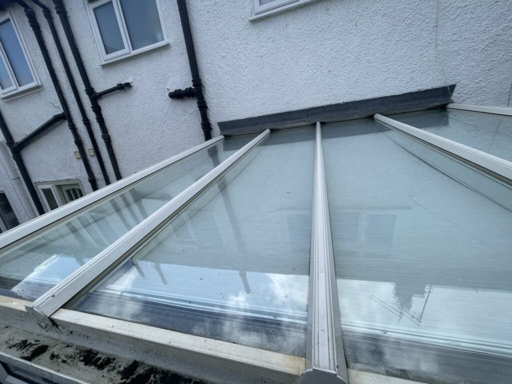 Dirty glass conservatory roof before cleaning in Airdrie